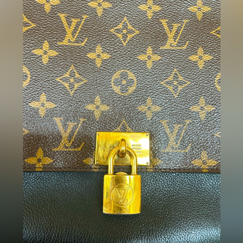 Louis Vuitton
Marignan Handbag Monogram Canvas with Leather $1600 - Picture 7 of 16